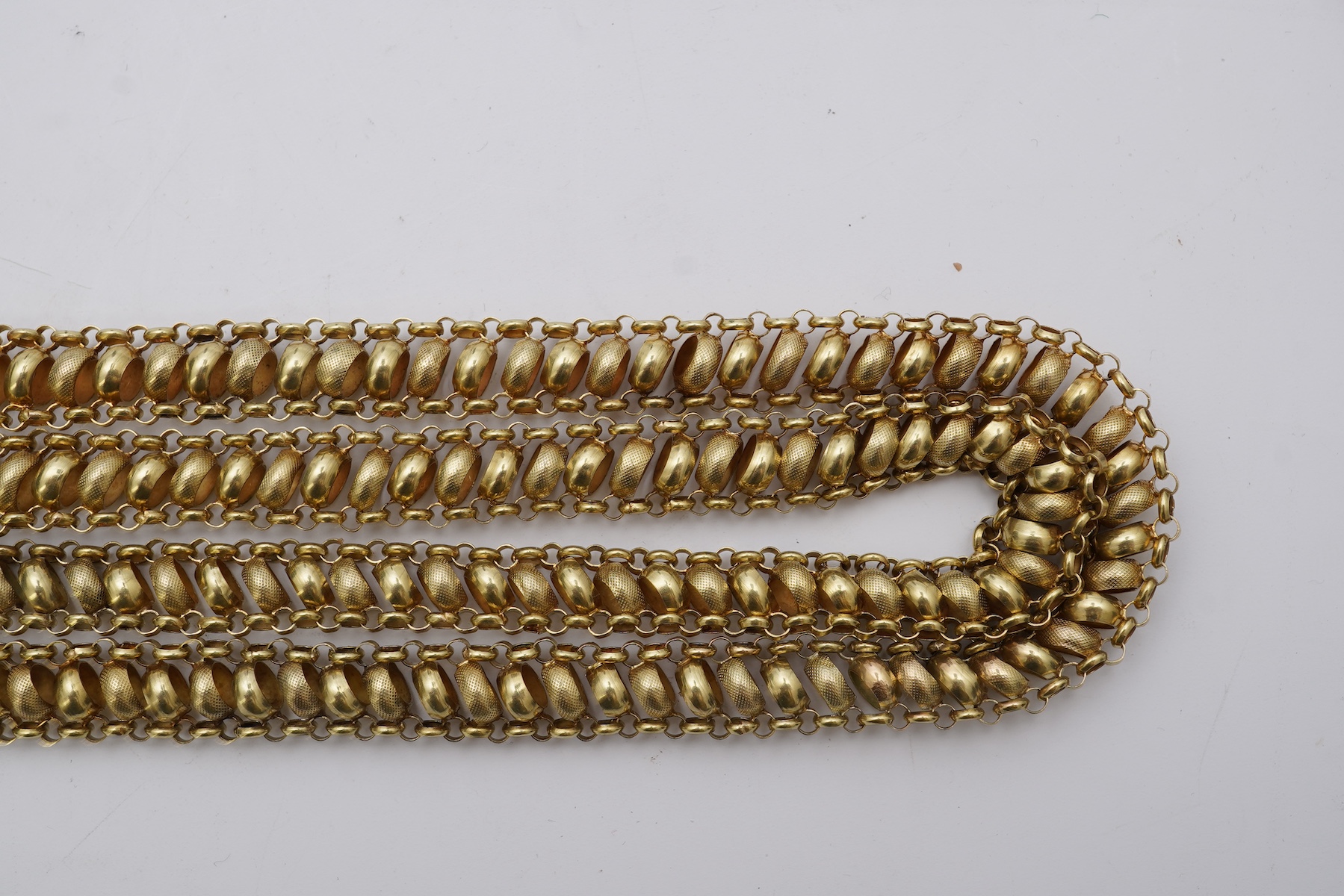 A gold long guard chain, 19th century